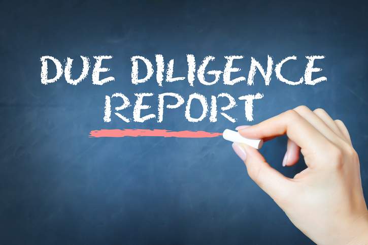due-diligence-report-text-written-with-chalk-on-blackboard