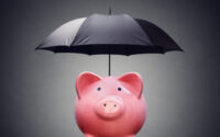 financial-insurance-or-protection-piggy-bank-with-umbrella