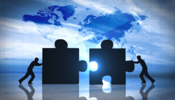 world-business-teamwork-puzzle-pieces