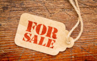 for-sale-sign-on-a-price-tag